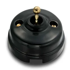 Fontini S.A. Svart Porslin Utanpå Fontini|Återfjädrande strömbrytare vipp svart porslin/mässing med kulohål - Fontini utanpåliggande